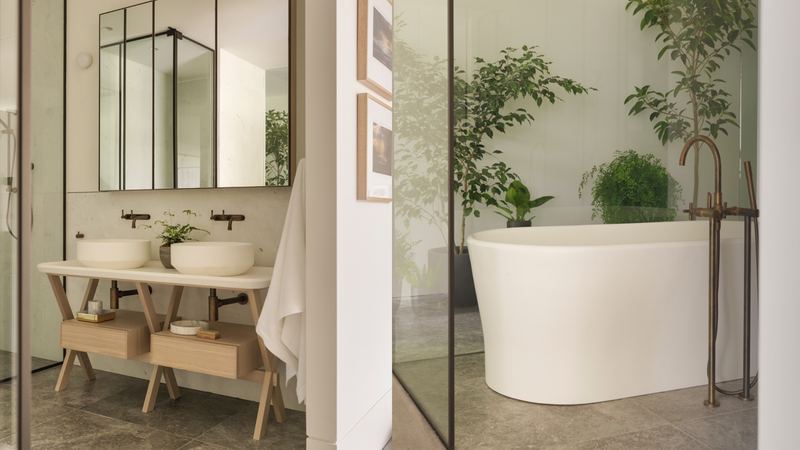 Designer Ensuite Renovation — honed travertine and brushed brass